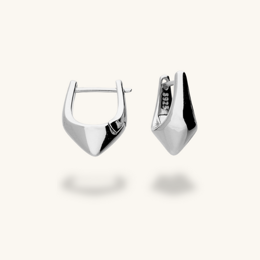 Sterling silver sculptural huggie earrings with pointed design